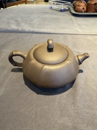 A collection of 20 Chinese Yixing stoneware teapots, 20th C.