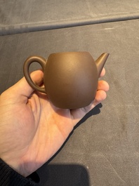A collection of 20 Chinese Yixing stoneware teapots, 20th C.