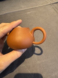 A collection of 20 Chinese Yixing stoneware teapots, 20th C.