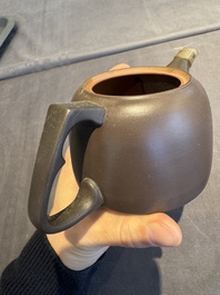 A collection of 20 Chinese Yixing stoneware teapots, 20th C.