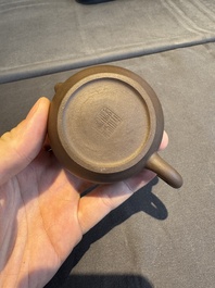 A collection of 20 Chinese Yixing stoneware teapots, 20th C.