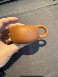 A collection of 20 Chinese Yixing stoneware teapots, 20th C.