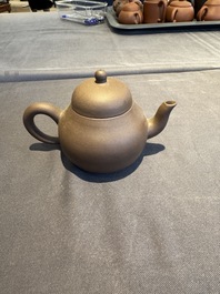 A collection of 20 Chinese Yixing stoneware teapots, 20th C.