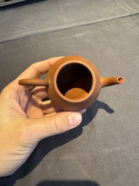 A collection of 20 Chinese Yixing stoneware teapots, 20th C.