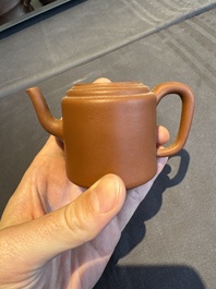 A collection of 20 Chinese Yixing stoneware teapots, 20th C.