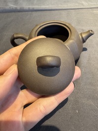 A collection of 20 Chinese Yixing stoneware teapots, 20th C.