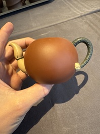 A collection of 20 Chinese Yixing stoneware teapots, 20th C.