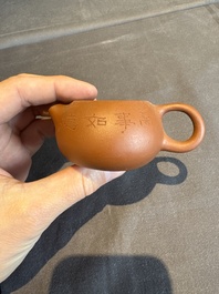 A collection of 20 Chinese Yixing stoneware teapots, 20th C.