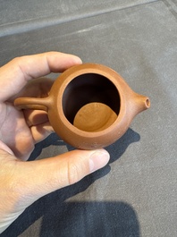 A collection of 20 Chinese Yixing stoneware teapots, 20th C.