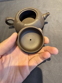 A collection of 20 Chinese Yixing stoneware teapots, 20th C.