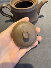 A collection of 20 Chinese Yixing stoneware teapots, 20th C.