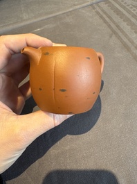 A collection of 20 Chinese Yixing stoneware teapots, 20th C.