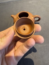 A collection of 20 Chinese Yixing stoneware teapots, 20th C.