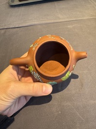 A collection of 20 Chinese Yixing stoneware teapots, 20th C.