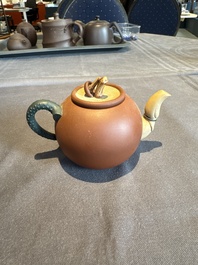 A collection of 20 Chinese Yixing stoneware teapots, 20th C.