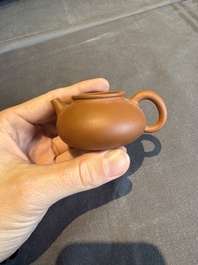 A collection of 20 Chinese Yixing stoneware teapots, 20th C.