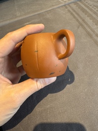 A collection of 20 Chinese Yixing stoneware teapots, 20th C.