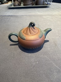 A collection of 20 Chinese Yixing stoneware teapots, 20th C.