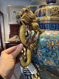A pair of large and impressive Chinese cloisonn&eacute; 'dragons and cranes' censers and covers, 19/20th C.