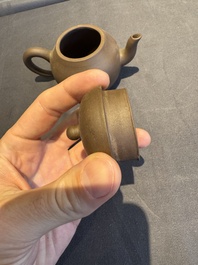 A collection of 20 Chinese Yixing stoneware teapots, 20th C.