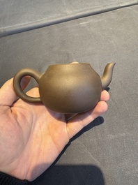 A collection of 20 Chinese Yixing stoneware teapots, 20th C.