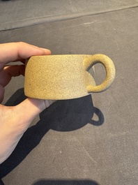 A collection of 20 Chinese Yixing stoneware teapots, 20th C.