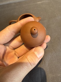 A collection of 20 Chinese Yixing stoneware teapots, 20th C.