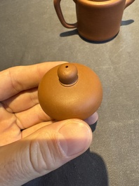 A collection of 20 Chinese Yixing stoneware teapots, 20th C.