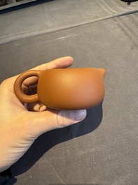 A collection of 20 Chinese Yixing stoneware teapots, 20th C.