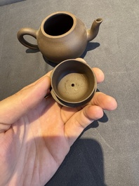 A collection of 20 Chinese Yixing stoneware teapots, 20th C.
