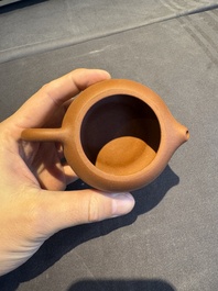 A collection of 20 Chinese Yixing stoneware teapots, 20th C.