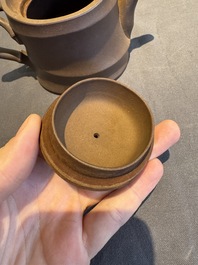 A collection of 20 Chinese Yixing stoneware teapots, 20th C.