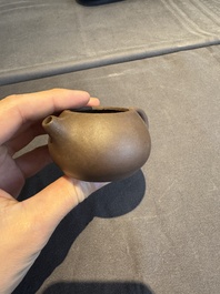 A collection of 20 Chinese Yixing stoneware teapots, 20th C.