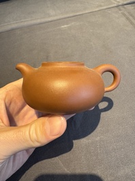 A collection of 20 Chinese Yixing stoneware teapots, 20th C.