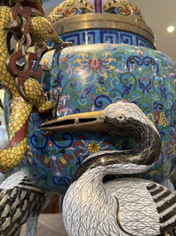 A pair of large and impressive Chinese cloisonn&eacute; 'dragons and cranes' censers and covers, 19/20th C.