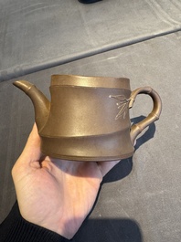 A collection of 20 Chinese Yixing stoneware teapots, 20th C.