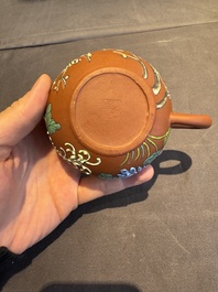 A collection of 20 Chinese Yixing stoneware teapots, 20th C.