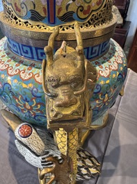 A pair of large and impressive Chinese cloisonn&eacute; 'dragons and cranes' censers and covers, 19/20th C.