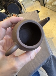 A collection of 20 Chinese Yixing stoneware teapots, 20th C.