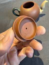 A collection of 20 Chinese Yixing stoneware teapots, 20th C.
