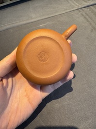 A collection of 20 Chinese Yixing stoneware teapots, 20th C.