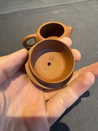 A collection of 20 Chinese Yixing stoneware teapots, 20th C.