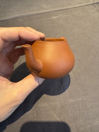 A collection of 20 Chinese Yixing stoneware teapots, 20th C.