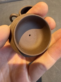 A collection of 20 Chinese Yixing stoneware teapots, 20th C.