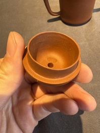 A collection of 20 Chinese Yixing stoneware teapots, 20th C.