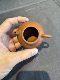 A collection of 20 Chinese Yixing stoneware teapots, 20th C.