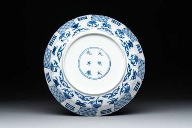 A Chinese blue and white 'erotic scene' plate, Kangxi