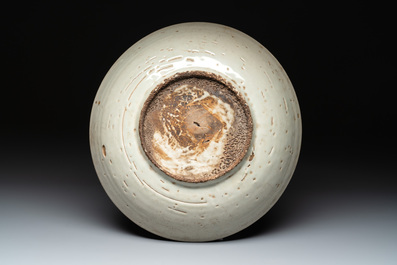 Two Chinese Swatow iron-red and green-enamelled 'phoenix' dishes and a vase, Ming