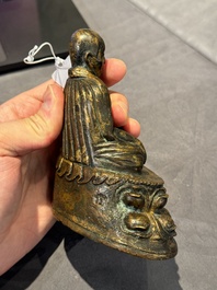 A Tibetan bronze Padmasambhava, 14th C.