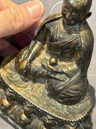 A Tibetan bronze Padmasambhava, 14th C.